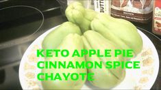 some green fruit on a white plate with the words keto apple pie cinnamon spice above it