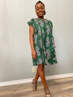 African Print Women's Tunic an| Kaftan| dashiki | Esiki | Esiki Dress| Agbada for Women| Women's Agbada| Wedding |Wardrobe Essentials |Tribal Print | African Print Product Description Aissa - Esiki dress This Agbada or also known as Esiki can be worn as a dress or a shirt with jeans or skirts. Sleeve Length: Sleeveless Fabric Content: 100% Cotton Fabric Quality: Authentic Wax Print Fabric Style: Tunic | Kaftan Collar: No Collar Lining: Lined Lining Material: None Embroidery: Embroidered Country Green Bohemian Dress With Split Neck, Green Split Neck Summer Dress, Green Shift Mini Dress For Beach, Green Printed Dresses With Relaxed Fit, Green Printed Dress With Relaxed Fit, Green Printed Relaxed Fit Dress, Shirt With Jeans, Wedding Wardrobe, Wax Print Fabric