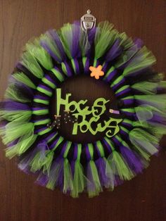 a purple and green tulle wreath with the word hope on it