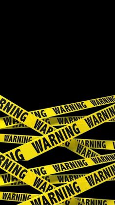 several yellow warning tapes with the words warning on them in black and yellow stripes, against a black background