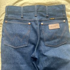 These Are Brand New Wrangler Jeans, Selling Because They Don’t Fit! It Says 28 But They Fit More Like A 26/27 Waist Denim Blue Straight Leg Bottoms For Rodeo, Western Style Denim Blue Bottoms With Pockets, Western Denim Blue Bottoms With Pockets, Dark Wash Cotton Bottoms For Rodeo, Blue Straight Leg Bottoms For Rodeo, Western Style Denim Blue Cotton Bottoms, Fitted Denim Blue Bottoms For Rodeo, Cotton Bottoms With Pockets For Rodeo, Blue Denim Western Bottoms