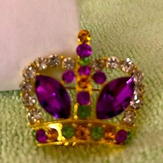 Nwts- Beautiful Jeweled Crown Brooch With Beautifully Set Purple, Green, & White Rhinestones In A Gold Setting. Lovely Fashion, Jewelry With A Pin To Attach To Your Clothes This Is For The Queen And Your Lifegreat Gift Too Purple Rhinestone Brooches As A Gift, Purple Rhinestones Brooch As A Gift, Purple Rhinestone Brooches As Gifts, Purple Rhinestone Party Brooches, Purple Rhinestone Brooches For Gifts, Green Costume Jewelry Brooch For Collectors, Purple Gemstone Brooches For Gift, Elegant Purple Rhinestone Brooches, Elegant Purple Gemstone Brooches