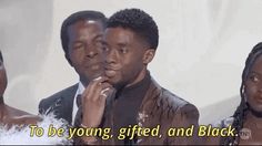 two men and a woman singing into microphones in front of a white background with the words to be young, gifted, and black