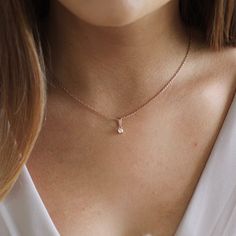 The Avery Necklace is all about embracing delicate charm. Its dainty chain and gemstone pendant design make it the perfect choice for adding a touch of elegance to your everyday style. Simple, yet stunning, it's the kind of necklace that effortlessly enhances your look.   Silver / Rose Gold / 18K Gold finish Main Metal- Stainless Steel Pendant measures 1cm length, 0.5cm width Length- 45cm + 5cm adjustable chain  The simple design of this necklace makes it a perfect match for so many of our earri Delicate Chain Pendant Birthstone Necklace, Elegant Birthstone Pendant Necklace With Adjustable Chain, Rose Gold Charm Necklace With Delicate Chain, Elegant Birthstone Necklace With Adjustable Chain And Round Pendant, Dainty Charm Necklace With Delicate Chain For Anniversary, Elegant Everyday Birthstone Necklace With Adjustable Chain, Delicate White Gold Teardrop Pendant Necklace, White Gold Birthstone Necklace With Delicate Chain, Rose Gold Solitaire Necklace With Delicate Chain