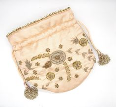 "flower indian artisan zardosi embroidery bag | gold metallic embellish wedding potli bag | golden art deco drawstring wallet purse handbag Package Contents: 1 Size: 8\" x 6\" Designed with the heart, this beautiful Potli or batawa bag are eye catchy and made of premium material. Key Features: Embroidery art work. This potli is good match with both Indian and western outfits and are superb for wedding and festive parties. This would be best complement to your designer saree, lenhga or any other Festive Gold Embroidered Potli Bag, Gold Embroidered Pouch For Gift, Gold Embroidered Potli Bag As Gift, Gold Embroidered Potli Bag, Gold Embroidered Potli Bag For Gift, Gold Potli Bag With Gold Embroidery For Gift, Gold Embroidered Pouch As A Gift, Festive Gold Embroidery Potli Bag, Gold Embroidered Evening Bag Gift