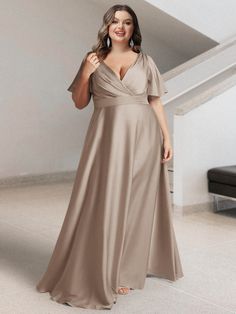 Lavetir sells a large selection of 2025 plus size bridesmaid dresses and wedding party dresses online. Our style creates a graceful and balanced silhouette that's perfect for plus sizes. Ideal for plus-size figures who want to accentuate their curves. Here is the dress detail: Fabric: Silk Satin; Silhouette: A-Line/Princess; Neckline: V-Neck; Hemline/Train: Floor-Length; Embellishment: Pockets; Sleeve: Short Sleeves; Waist: Natural; Back Style: Lace Up; Built-In Bra: Yes; Season: Spring; Summer; Aw Bridal, Plus Size Bridesmaid Dresses, Pinterest Trends, Sage Green Bridesmaid Dress, Sage Green Dress, Simple Bridesmaid Dresses, Dress Sage, Dresses With Pockets, Affordable Bridesmaid Dresses