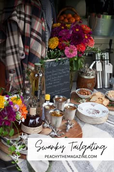 a table topped with lots of different types of food and drinks on top of it