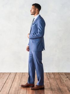 Like a breeze over the waves, our marine blue suit imparts a refreshing, breezy quality to your look, whether you’re celebrating on the sea or landlocked and living it up. Pairs best with our Marine Blue Pants. 100% super-fine merino wool Two-button closure Notch lapels Side vents Fully canvassed Fitted Blue Suit With Pockets, Fitted Blue Suits With Pockets, Blue Fitted Suits With Pockets, Blue Suits With Welt Pockets For Spring, Blue Long Sleeve Suits With Welt Pockets, Blue Suits With Pockets For Business Casual, Blue Business Casual Suit With Pockets, Tailored Blue Pantsuit With Pockets, Blue Pantsuit With Pockets And Suit Collar