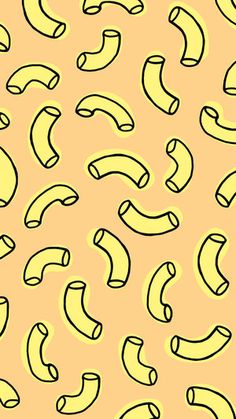 a yellow and black pattern with many curved objects on it's side, including bananas