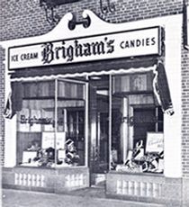 an old photo of the front of a store