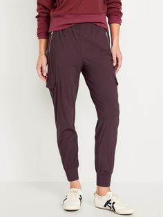 elastic waistband zippered hip pockets flap-cargo pockets at thigh go-dry wicks moisture breathable sits at belly button relaxed thigh 27" regular inseam 25" petite inseam 30" tall inseam models are approx.  5'9" and wear sizes s (4), l (12), and xl (18)machine wash according to the care instruction label  . Best Holiday gift for Women , perfect Joggers for Christmas! Mid-rise Comfort Stretch Activewear With Pockets, Functional 4-way Stretch Bottoms With Cargo Pockets, Nylon Joggers With 4-way Stretch And Pockets, Functional Mid-rise Bottoms With Pockets, Stretch Nylon Cargo Pants With Functional Pockets, Comfort Stretch Outdoor Bottoms With Pockets, Stretch Athleisure Bottoms With Zip Fly, Comfort Stretch Nylon Bottoms With Pockets, Sporty Mid-rise Cargo Pants With Elastic Waistband