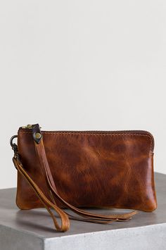 Overland Santa Fe Bison Leather Wristlet Clutch Wallet Daily Use Clutch With Wrist Strap In Pouch Shape, Everyday Handheld Clutch With Wrist Strap, Handheld Clutch With Wrist Strap For Everyday Use, Formal Rectangular Bag With Wrist Strap, Coin Purse Clutch With Wrist Strap, Rectangular Clutch With Zipper Pouch For Formal Occasions, Rectangular Clutch With Zipper Pouch For Formal Events, Classic Clutch With Wrist Strap For Everyday Use, Elegant Handheld Travel Wallets