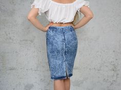 "DESCRIPTION - vintage acid wash jean skirt - high waisted - materials: 100% cotton - CONDITION (1-10): ❶❷❸❹❺❻❼❽ Good condition - The model is 5'9\" (174 cm), measures 35-27-38 (90-69-96 cm) and wears size M SIZE/MEASUREMENTS label: 12 best fits: S/M waist (circuit): 29 inches (74 cm) hips: 35,5 inches (90 cm) length: 28 inches (60 cm) WE SHIP WORLDWIDE FOLLOW US: instagram.com/vintage_shop_gertrude/" Stonewashed Fitted Denim Bottoms, Fitted Stonewashed Denim Bottoms, Fitted Cotton Stonewashed Bottoms, Fitted Stonewashed Cotton Bottoms, Fitted Acid Wash Vintage Bottoms, Fitted Denim Blue Washed Skirt, Fitted Washed Denim Blue Skirt, Fitted Washed Denim Skirt, Fitted High Rise Washed Skirt