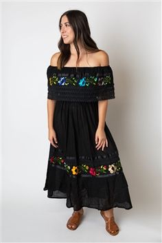 Shop for Mexican Pueblo Crochet Dress - Black. These are traditional Mexican dresses commonly used at Fiestas like 5 de Mayo that feature embroidered flower designs. Black Dresses For Cinco De Mayo Fiesta, Traditional Black Dress For Cinco De Mayo, Traditional Black Embroidered Dress For Fiesta, Black Floral Embroidered Dress For Festival, Traditional Black Fiesta Dress, Black Folk Dresses With Intricate Embroidery, Black Embroidered Dress For Spring Fiesta, Black Embroidered Dress For Fiesta In Spring, Black Dress With Floral Embroidery For Fiesta