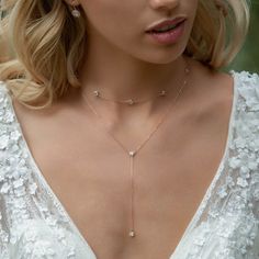 bridal jewelry, Swarovski necklace, bridal necklace, wedding necklace Handmade in NYC, please allow for 10-15 business days of crafting time. EXPEDITE ORDERS: Choose 5-day crafting time in pull-down menu and choose expedited shipping when checking out. ► Spend $200 | Receive 10% OFF Your Order with Code: 10OFF200 ► Please note in your order when your wedding date is MATERIALS + MEASUREMENTS: - .925 Sterling Silver or 14k Rose Gold/ 14K Gold over .925 Sterling Silver - Cubic Zirconia crystals 5 M Elegant Crystal Backdrop Necklace As Gift, Elegant Crystal Backdrop Necklace For Gift, Crystal Clavicle Chain Backdrop Necklace As Gift, Formal Crystal Jewelry With Delicate Chain, Crystal Backdrop Necklace With Clavicle Chain For Gifts, Elegant Cubic Zirconia Backdrop Necklace With Delicate Chain, Elegant Gold Crystal Lariat Necklace, Delicate Clavicle Chain Backdrop Necklace For Weddings, Crystal Clavicle Chain Backdrop Necklace For Wedding