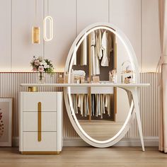 a dressing room with an oval mirror on the wall and white furniture in front of it