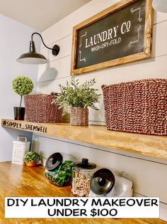 a shelf with baskets and other items on it in front of a sign that says laundry co