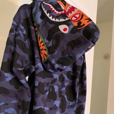 Bape Blue Camo Tiger Shark Wide Full Zip Double Hood Hoodie Large - New W Tags Brand Nw With Tags And Bag. Size Is Large ( Please Remember Japan Sizes Are Smaller Than Us Size) See Measurements Measurements Are 44" Around Chest And 26" Long From Top Of Shoulder To Bottom Of Hoodie Features Heavyweight Double Hood, See Photos Full Zip Jacket Syle Hoodie ( Two Zippers, One On The Bottom And One On The Top) White Jordan Hoodie, Blue Bape Hoodie, Bape Hoodie, Tiger Hoodie, Nike Pullover Hoodie, Shark Hoodie, Maroon Hoodie, Tiger Shark, Nike Pullover