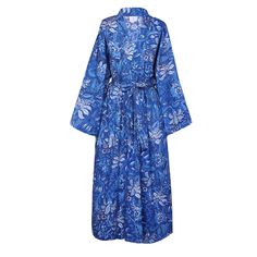 Introducing the Delfina robe—a true embodiment of elegance and sophistication. Crafted from a luxurious blue fabric adorned with intricate blue and white floral motifs, this robe captures the essence of the serene Greek Isles. This unique hand block printed pattern is made on 100% fine cotton and gets softer and softer with each wash! The Delfina print is a masterpiece of block printing, meticulously created by skilled artisans who infuse every detail with precision and artistry. The border of t Blue Floral Print Lounge Dresses, Elegant Cotton Kimono, Blue Floral Print Long Sleeve Kimono, Elegant Blue Floral Print Kimono, Blue Long Sleeve Kimono With Floral Print, Blue Summer Robe For Daywear, Elegant Blue Kimono For Vacation, Blue Robe For Spring Daywear, Blue Kimono With Kimono Sleeves For Daywear