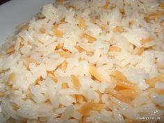 closeup of rice on a white plate