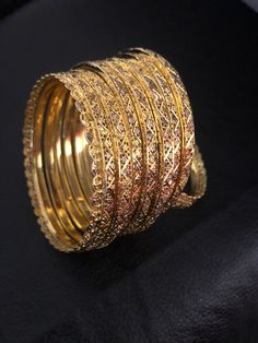 Intricate and classic. Pure silver 92.5 bangles! The details worth falling for❤️ A pure handcrafted and 24 KT gold plating over pure silver 92.5 bangles set, this festive season. Love these creations!! Absolutely stunning Bangles set : 8 piece Bangles set included: 6 bangles and two kadas Size : 2.6 Silver weight: 80.00 Garam and 200.00 milligrams Can be customize in any size. Made to order and shipping time 4-6 weeks. Braid Accessories, Bangles Set, Pakistani Jewelry, Kundan Earrings, 24kt Gold, Kundan Jewellery, Bangle Set, 925 Silver Jewelry, 925 Jewelry