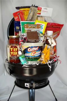 a basket filled with food and condiments on top of a grilling pan