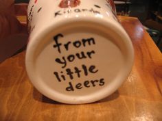 a coffee cup with writing on it that says from your little deers