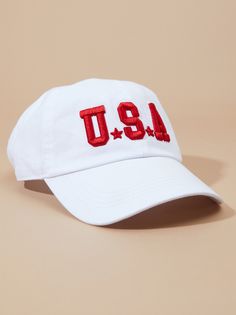 Show your patriotic pride with this classic baseball cap. Embroidered with "USA" it's the perfect way to rep your country in comfort. The adjustable clasp ensures a snug fit for all-day wear. Romper And Boots, Trucker Hats For Women, White Dress Boots, Baseball Trucker Hat, Embroidered Baseball, Embroidered Baseball Caps, Altar'd State, Trucker Hats, Dress With Boots