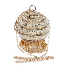 Simulated Pearl, Diamond, Rhinestones, Metal Crossbody Clutch Imported. For Wedding, Graduation, Holidays. Luxury Formal Bag With Beaded Fringe, Elegant Evening Bags With Beaded Fringe, Elegant Evening Bag With Beaded Fringe, Gold Tasseled Clutch For Evening, Elegant White Bags With Tassels, Gold Evening Clutch With Tassels, Gold Wedding Bag With Tassels, Gold Tassel Bags For Formal Occasions, Elegant Beaded Fringe Evening Bag For Formal Occasions