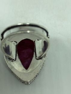 Unusual deep toned raw Ruby low content silver setting handmade size 8 Can be resized. My jeweler charges a $10- $20 fee All rings are shipped in a nice gift box. Check out our over a THOUSAND great reviews Engraving is $4 per letter and is not always perfect depending on the piece. It can take a few days if the jeweler is busy. This is payable to Paypal Judithsltd@gmail.com Raw Ruby, Gothic Ring, Pink Ruby, Gothic Rings, 20 Gifts, 925 Sterling Silver Ring, Lovely Gift, Rose Quartz, Statement Rings