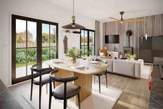 an open concept living and dining area with sliding glass doors leading to the outside patio