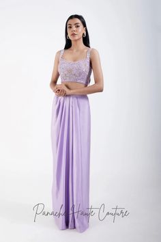 Lavender Color Dhoti with Hand-embroidered Crop Top – Panache Haute Couture Purple Tissue Silk Pre-draped Saree For Reception, Elegant Lavender Sharara With Zari Work, Evening Silk Sets With Cutdana, Silk Palazzo Set For Evening With Traditional Drape, Silk Palazzo Set With Traditional Drape For Evening, Bollywood Style Purple Raw Silk Pre-draped Saree, Fitted Lavender Traditional Wear With Resham Embroidery, Lavender Fitted Traditional Wear With Resham Embroidery, Elegant Lavender Saree Set