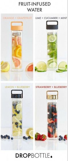 four different types of fruit in a glass water bottle with strawberries, lemons, blueberry and strawberry