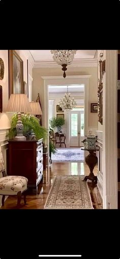 the hallway is clean and ready for guests to use it as an entrance way in this home