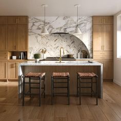 a kitchen with marble counter tops and wooden stools