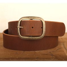 Our 100% Real Leather snap closure belts are handcrafted with lots of love right here in our studio, and the entire process is done by hand, and made to order. We use the finest full grain leather to produce our belts, and each one comes standard with a basic buckle. Please note: This is a handmade product made with natural materials so the color and finish may vary slightly from the image shown.Sizing:Please see our helpful size chart within the images of this listing. If you don't see your size in the chart we are able to create almost any custom size, just message us with you're exact waist measurement. This belt is 1.5" wide to fit standard belt loops, and works great with denim. If you need a different width, length, extra holes, or color request please reach out to us as we may be ab Custom Belt Buckles, Custom Belt, Handcrafted Accessories, Waist Measurement, Brown Leather Belt, Brass Buckle, Dark Brown Leather, Leather Belts, Full Grain Leather