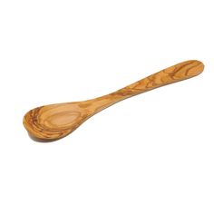 a wooden spoon sitting on top of a white surface