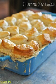 a blue casserole dish filled with baked bread