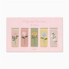 a card with four different flowers on it