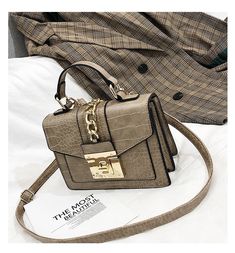 Shape: FLAPHandbags Type: Shoulder BagsTypes of bags: Shoulder HandbagsOrigin: CN(Origin)Main Material: PUClosure Type: HaspHardness: HARDExterior: NONEStyle: vintageModel Number: ZZ990Lining Material: PolyesterOccasion: VersatileGender: WOMENPattern Type: AlligatorNumber of Handles/Straps: SingleInterior: Cell Phone PocketInterior: Computer InterlayerDecoration: ChainsDecoration: LOCKItem Type: Handbags Sacs Design, Artificial Leather, Coach Swagger Bag, Square Bag, Luxury Women, Guangzhou, Leather Design, Leather Handbag, Shoulder Handbags