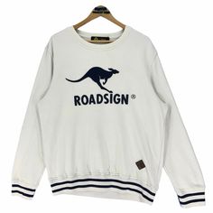 Vintage Roadsign Australia crewneck sweatshirt in white colour. Embroidered embossed logo on the front. Still in good condition. SEE THE PICTURES FOR MORE DETAILS. CONDITION : 9/10 MEASUREMENT Pit : 24 inch Length : 28 inch Shoulder : 19 inch Arm Length : 26.5 inch Size On Tag : XL Recommended Size : L-XL PAYMENT We accept PayPal only. The item will be ship 3-5 days once the payment has been made. SHIPPING DHL ONLY. USUALLY AROUND 7-21 DAYS BEFORE REACH THE DESTINATION. *NOTES TO BUYERS* PLEASE Oversized White Sweatshirt With Kangaroo Pocket, Cotton Sweatshirt With Kangaroo Pocket For Streetwear, Streetwear Sweatshirt With Kangaroo Pocket, Vintage Sweatshirt With Kangaroo Pocket, Kangaroo Pocket Sweatshirt, Club Sweatshirts, Polo Club, Road Signs, Embossed Logo