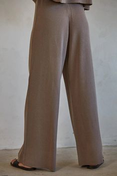 Experience the perfect blend of comfort and style with the By Together Leonie Pants. These pull-on pants feature a flattering wide leg silhouette and flowy design, while the ribbed fabrication adds a touch of elegance. Perfect for any occasion, these pants are easy to wear and flatter all body types! With the luxurious neutral mocha color, elevated and timeless silhouette, plus the option to pair with our matching Leonie Top, these bottoms are the perfect piece to add to your year round closet r Blue Floral Sundress, High Neck Sleeveless Top, High Waisted Wide Leg Pants, Flowy Design, High Neck Sleeveless, Ruffle Shirt, Denim Accessories, Pant Shirt, Pull On Pants