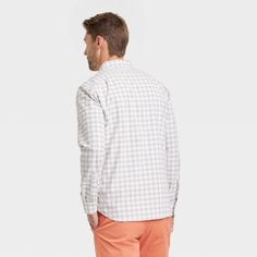 Whether you're headed to office or hanging out with friends, take on your busy day in style with this Long-Sleeve Button-Down Shirt from Goodfellow & Co™. Boasting a checkered pattern, the shirt is made from cotton-blend fabric with added spandex for comfortable wear that moves with you. It's designed with a collared neckline with a button-down front, along with a chest patch pocket for classic style. Wear it with anything from jeans to chinos for cool, casual style. Goodfellow & Co™: Where styl Casual Dress Shirt With Relaxed Fit For Daywear, Casual Dress Shirt For Daywear, Casual Dress Shirt With Buttons For Daywear, Casual Long Sleeve Dress Shirt With Button Closure, Casual Collared Dress Shirt For Fall, Casual White Dress Shirt For Fall, Casual Long Sleeve Dress Shirt, Fall Casual Collared Dress Shirt, Casual Fall Collared Dress Shirt