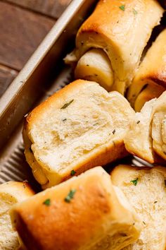 several pieces of bread that have been cut in half and are sitting on a tray