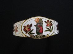 "This is a So Pretty Mid Century Vintage Gold Tone Metal With Colorful White Red and Forest Green Enamel Etched Embossed Dainty Rose Flowers Leaves Floral Leaf With Sitting Lion Tiger at The Center Hinged Bangle Cuff Bracelet The width of the bangle is one inch at the widest point; the opening measures 2 and a half inches at the bracelet's widest point, this piece will fits up to 7-1/2\" wrist. Very nice vintage piece and is in very good to excellent vintage condition with very little/minor sign Traditional White Cuff Bracelet (bangle Style), Traditional White Cuff Bracelet Bangle, Traditional White Cuff Bangle Bracelet, Traditional White Bangle Cuff Bracelet, Dainty Rose, Lion Tiger, Gold Chain Jewelry, Monogram Design, Rose Flowers