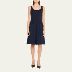 Oscar de la Renta dress with an inverted pleat Scoop neckline Sleeveless Hip flap buttoned pockets Knee length A-line silhouette Back zip Virgin wool/elastane/nylon/polyamide Dry clean Made in Italy Chic A-line Midi Dress With Side Pockets, Sleeveless A-line Dress For Work, Midi-length Sleeveless Dress With Pleated Back For Work, Sleeveless Midi Dress With Pleated Back For Work, Elegant Sleeveless Midi Dress With French Seams, Fitted Knee-length Sleeveless Dress With Pleated Back, Sleeveless Midi Dress With Box Pleat For Formal Occasions, Knee-length Sleeveless Dress With Pleated Back, Elegant Sleeveless Midi Dress With Pockets