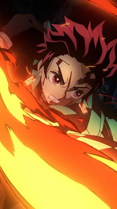 an anime character with black hair and red eyes looking out from behind a flame in the dark