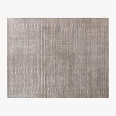 a beige rug with vertical stripes on it