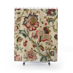 a shower curtain with floral designs on it