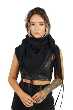 Our take on the festival scarf comes in classic black with leather decorative elements. The timeless aesthetic makes it the ultimate wardrobe staple both for festival wear and for layering in your day to day. As you know, a festival scarf is an absolute necessity for dusty raves. Our scarf doubles as a festival shawl which is wonderful for keeping the sun off your skin or keeping you warm on a summer evening. The generous size means you could also use it as a throw blanket. FEATURES: Made with b Black Bohemian Scarf For Fall, Cyberpunk Accessories, Festival Scarf, Gothic Love, Accessories Gothic, Gloves Dress, Festival Scarves, Timeless Aesthetic, Decorative Elements